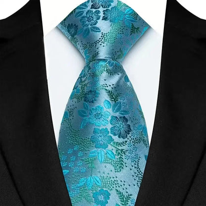Stylish striped neck tie in rich hues of green and blue, suitable for adding a refined touch to any formal outfit.