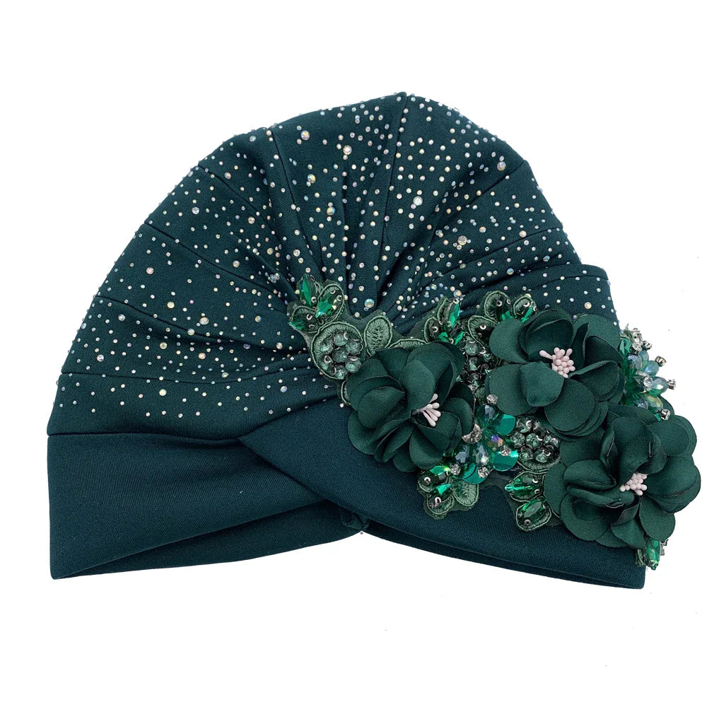 Luxurious African turban cap in a refined design, embellished with shimmering rhinestones, ideal for fashionable women.