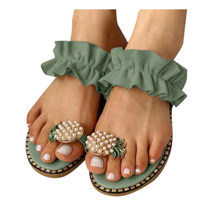 Elegant PU upper silhouette showing off the exquisite detailing of the women’s pineapple pearl flat sandals, perfect for casual summer wear.