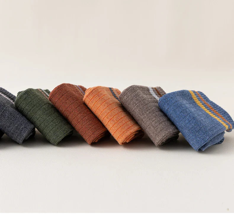 Refined men's winter sports socks set, includes five pairs of stylish crew socks meticulously crafted for durability and comfort, ideal for both active pursuits and leisure.