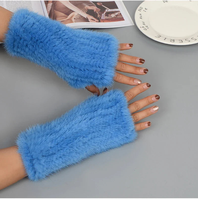 Stylish women's mink fur gloves with a half-finger design, ensuring warmth and functionality for modern women.