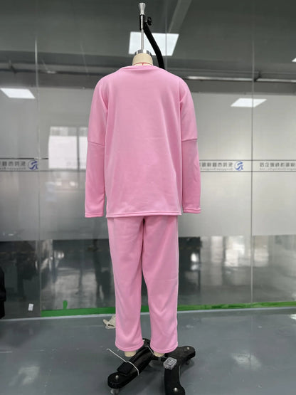 Elegant women's two piece set featuring a solid full sleeve O-neck top paired with stylish midi waist long pants adorned with functional pockets.