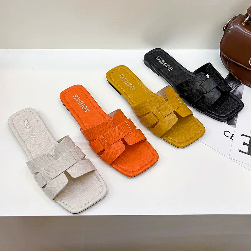 Exclusive women's flat sandals, showcasing a stylish gladiator design, crafted from durable PU for comfort and luxury.