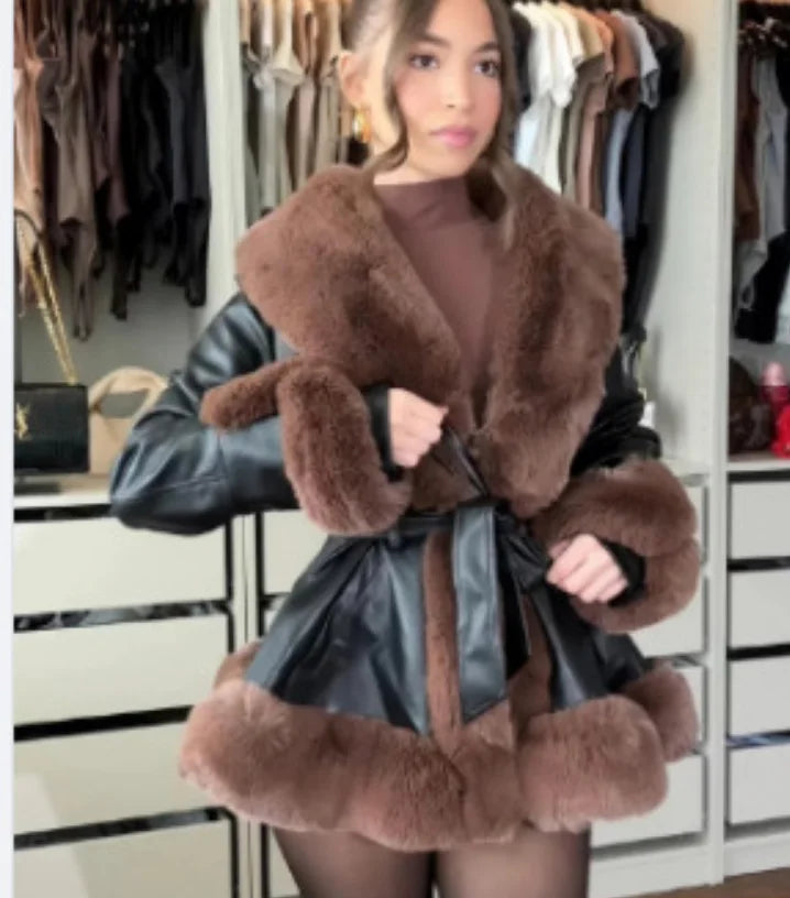 Elegant women's luxury faux leather jacket featuring warm imitation rabbit hair and adjustable waist for a stylish winter look.