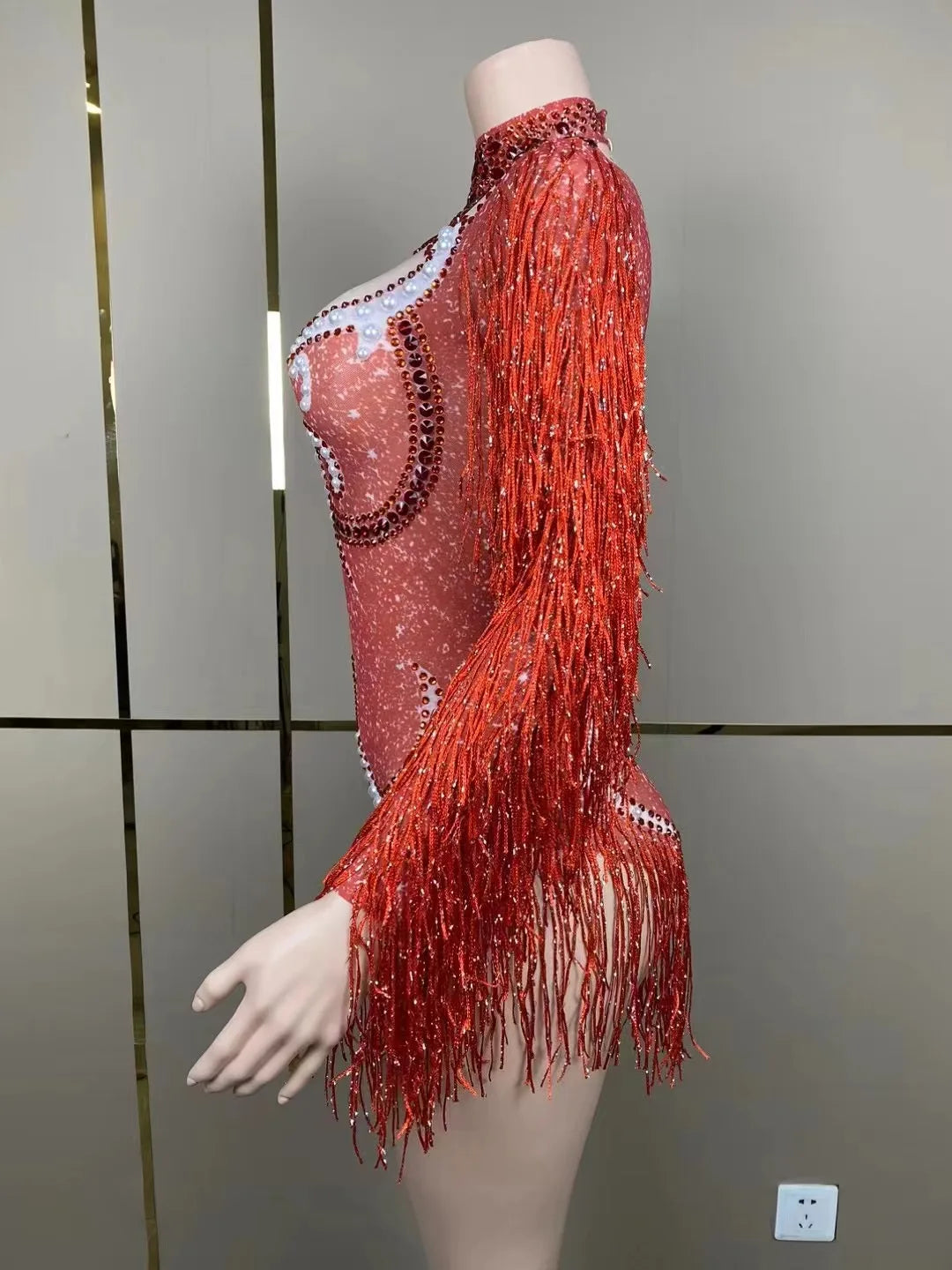 Model wearing a luxury women's cha-cha dance practice suit, highlighting the vibrant colours and sophisticated design ideal for dance enthusiasts.