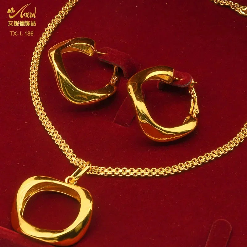 Stylish display of the 24K gold-plated copper jewelry set, including geometric necklace and earrings designed for women seeking elegance at any occasion.