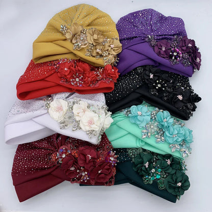 Chic head wrap designed as an African turban cap with elegant rhinestone details, suitable for women who embrace stylish sophistication.