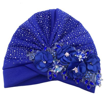 Versatile African turban cap, highlighting its trendy rhinestone embellishments and luxurious appeal, tailored for discerning women's fashion.