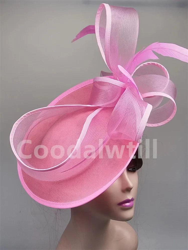 Chic solid grey fascinator hat showcasing delicate design details, ideal for church gatherings and formal occasions.
