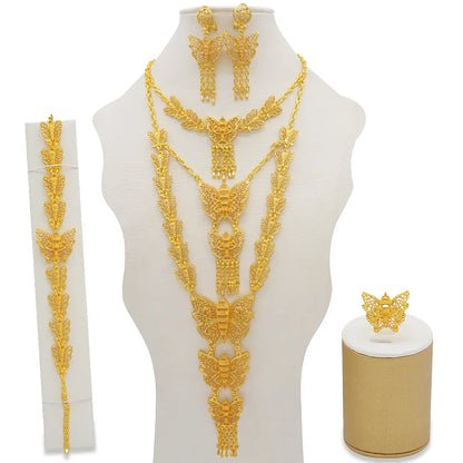 Fashionable gold colour jewelry set for women inspired by African elegance, includes a detailed necklace, beautiful earrings, matching bracelet, and a chic ring for special events.