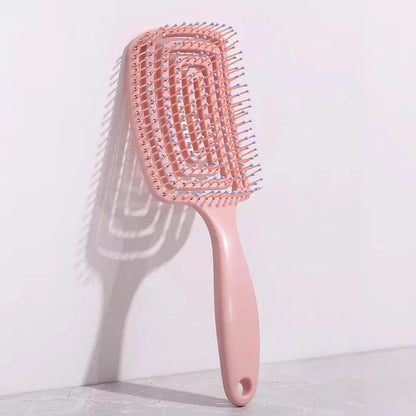 Sophisticated massage comb, perfect for achieving smooth hairstyles while pampering the scalp with every stroke.
