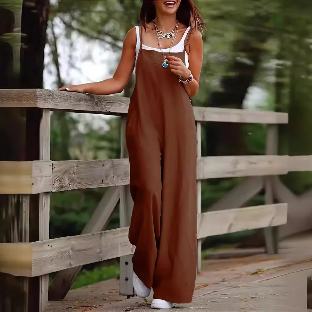 Luxurious Women's Plus Size Ankle-Length Jumpsuit in Cotton Linen, featuring a chic solid design, wide leg cut, and practical pockets, perfect for spring and summer streetwear.