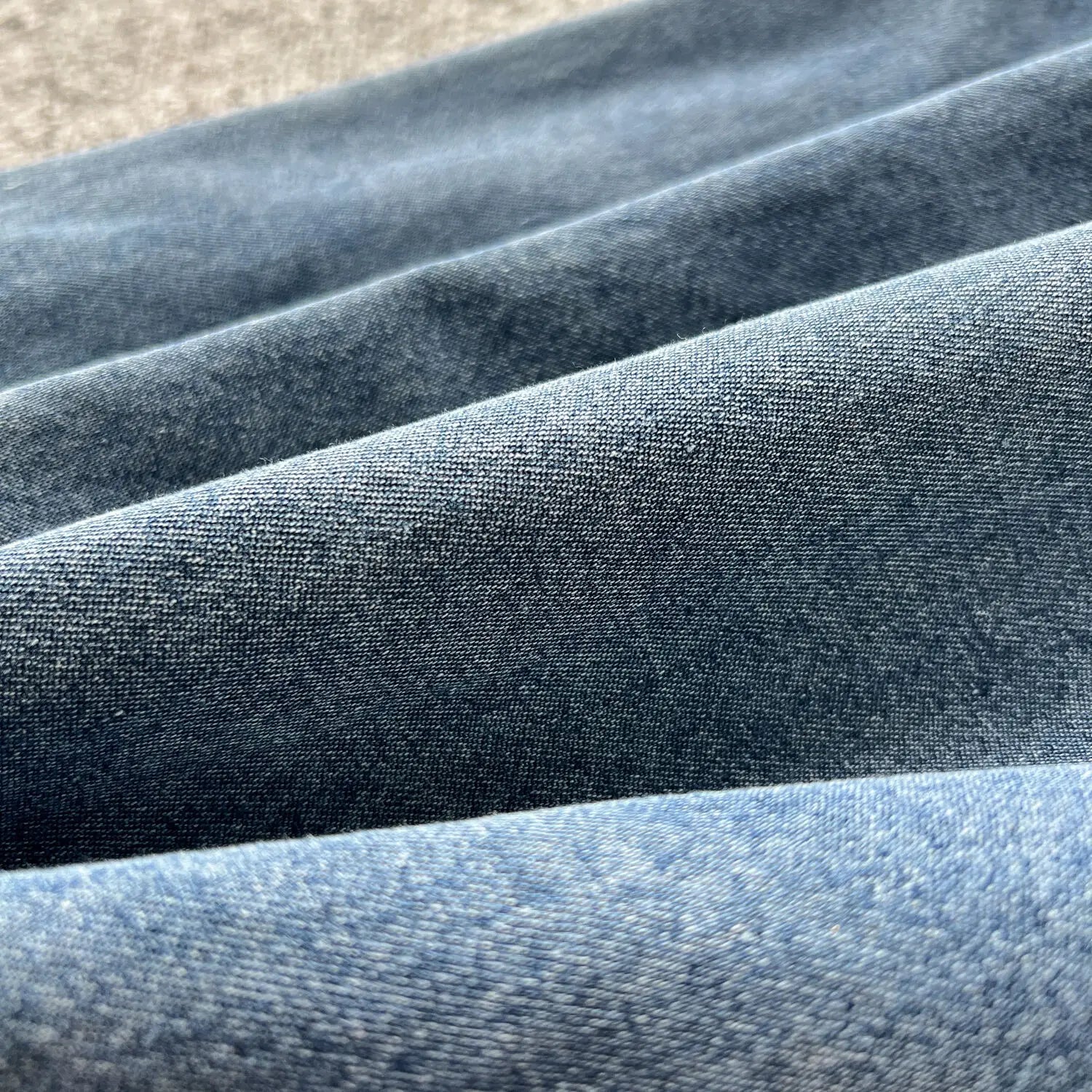 Back view of the WTHT Women's Long Denim Dress, detailing the seamless fit and exquisite design for women seeking comfort blended with luxury elegance.