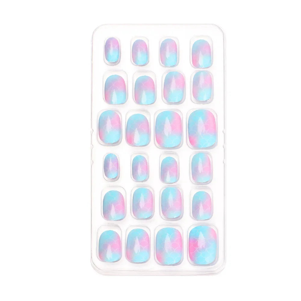Charming assortment of vibrant acrylic false nails for girls, beautifully decorated with candy-themed floral patterns, ideal for gifting.
