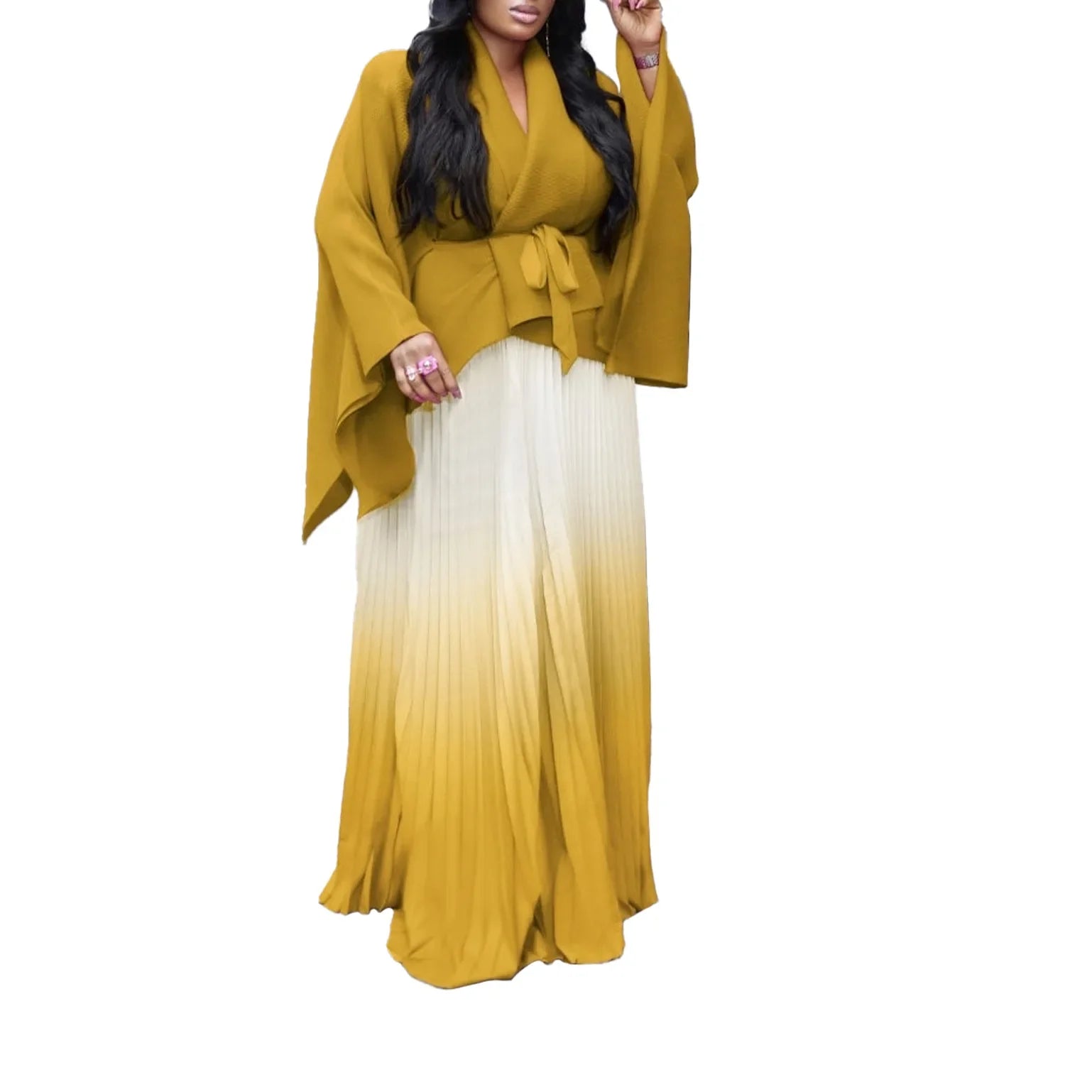 Sophisticated two-piece set from CM.YAYA featuring a full sleeve blouse and a floor-length skirt, ideal for high street fashion.