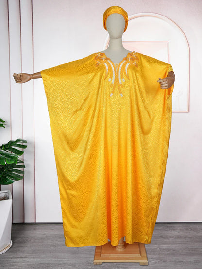 High-quality African Muslim kaftan for women, characterised by its lavish fabric and exquisite embroidery, perfect for all seasons.