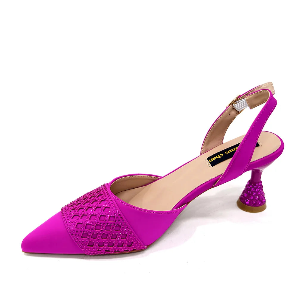 Elegant Nigerian women's wine colour heeled shoes with rhinestones, a perfect accessory for weddings and parties, showcasing a sophisticated design with a pointed toe and stylish slingbacks.