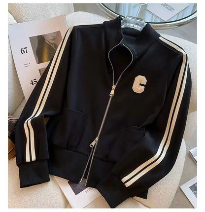 Elegant women's leisure two-piece sports set composed of stretchy wide-leg pants and intricately embroidered coat, ideal for autumn and winter fashion.