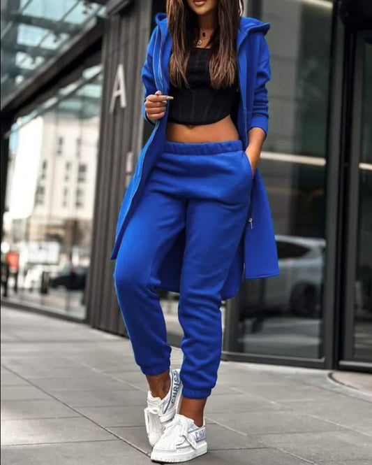 Luxury women's hooded zipper long coat tracksuit featuring ankle-length pants, perfect for office style. Crafted from a cotton linen blend for a regular fit and adorned with decorative fake zippers, this chic outfit combines comfort and elegance, ideal for autumn and winter.