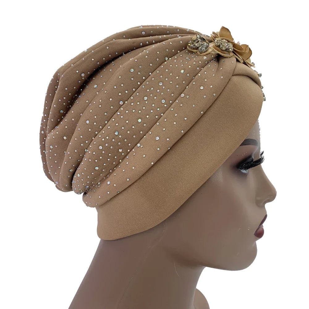 Versatile African turban cap, ideal for all seasons, illustrating the elegant silhouette and standout rhinestone features.