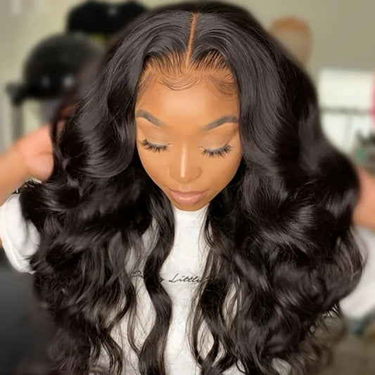 Luxury 180D Body Wave Lace Front Wig made from Brazilian human hair with a transparent lace T part, showcasing wavy texture and elegance.