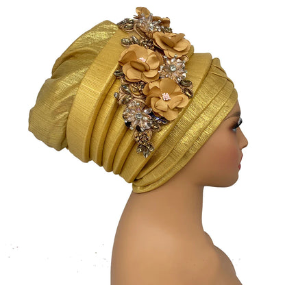 Luxurious African women's turban cap featuring diamond flower decoration, ideal for elegant head wrap styling.