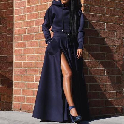 Luxurious overhead view of CM.YAYA Women's Two-Piece Set showcasing the pullover hoodie and floor-length A-Line skirt design, crafted from high-quality spandex and polyester blend.