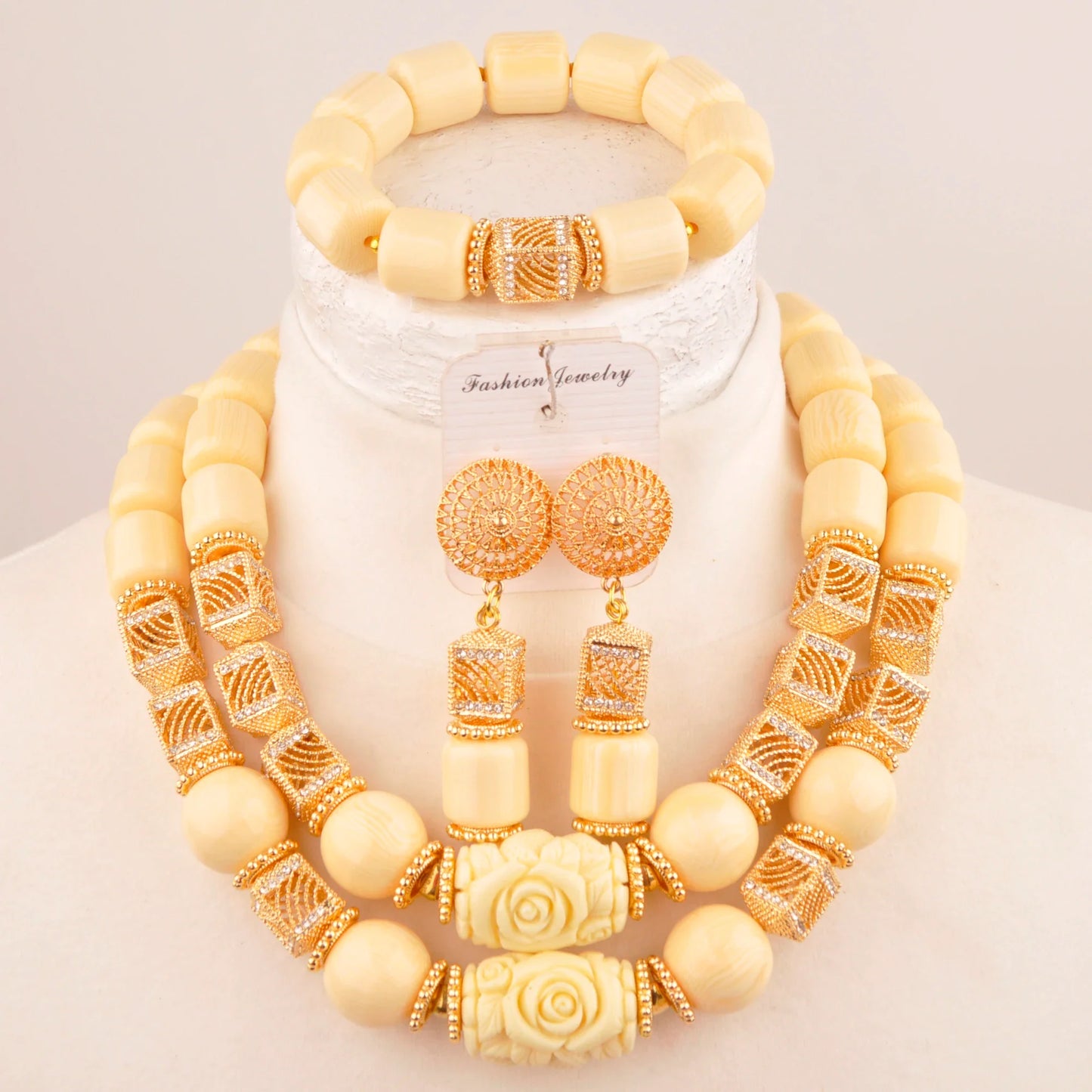 Dazzling Nigerian earrings part of an elegant bridal jewelry set, featuring artificial coral beads, designed to add a touch of luxury and sophistication to wedding attire.