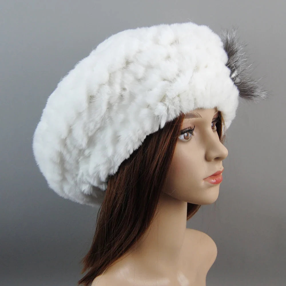 Luxurious women's winter faux fur hat and scarf set, featuring an elegant knit design, perfect for cold weather.