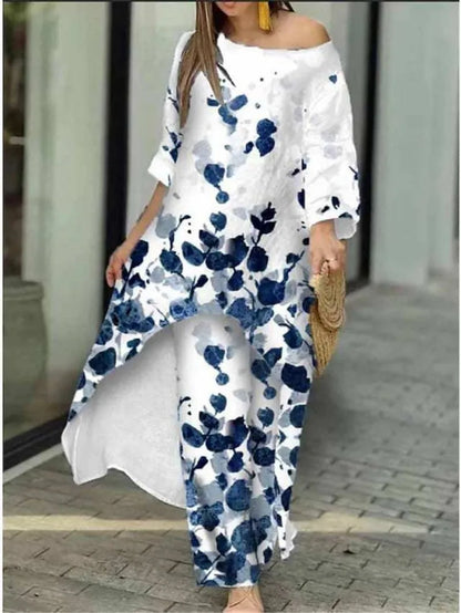 Luxurious women's Spring/Summer 2-piece set featuring a casual loose irregular printed round neck shirt paired with high waist wide leg pants.