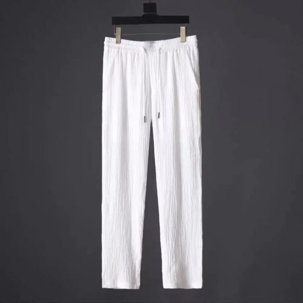 Sophisticated long pants for men with an elastic waistband, part of a luxury casual summer suit set.
