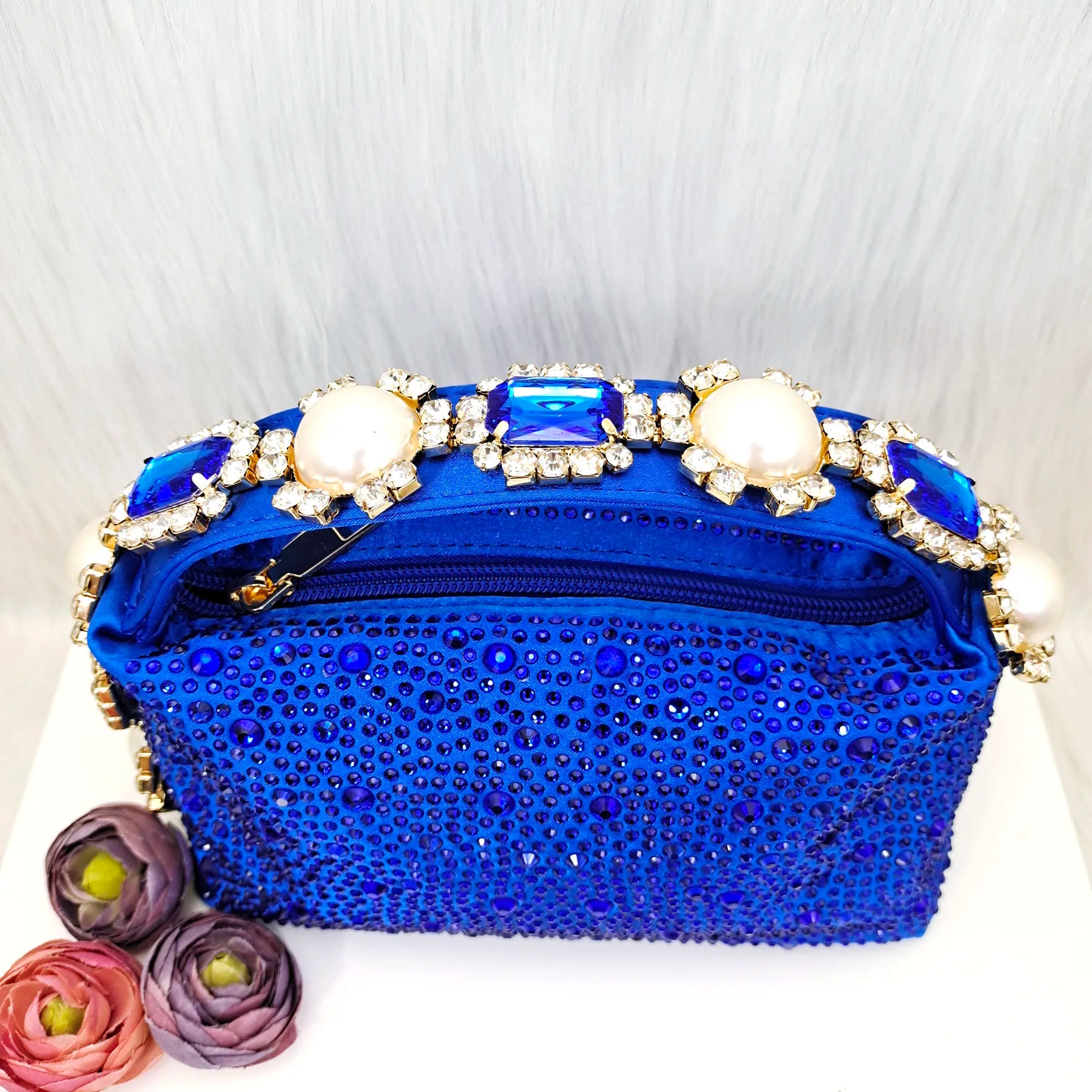 Stylish blue women's stiletto heels sandals featuring intricate rhinestone and pearl detailing, perfect for upscale events and parties.