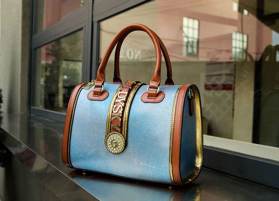 Fashion-forward women's handbag with a spacious interior, crafted from high-quality microfiber leather.