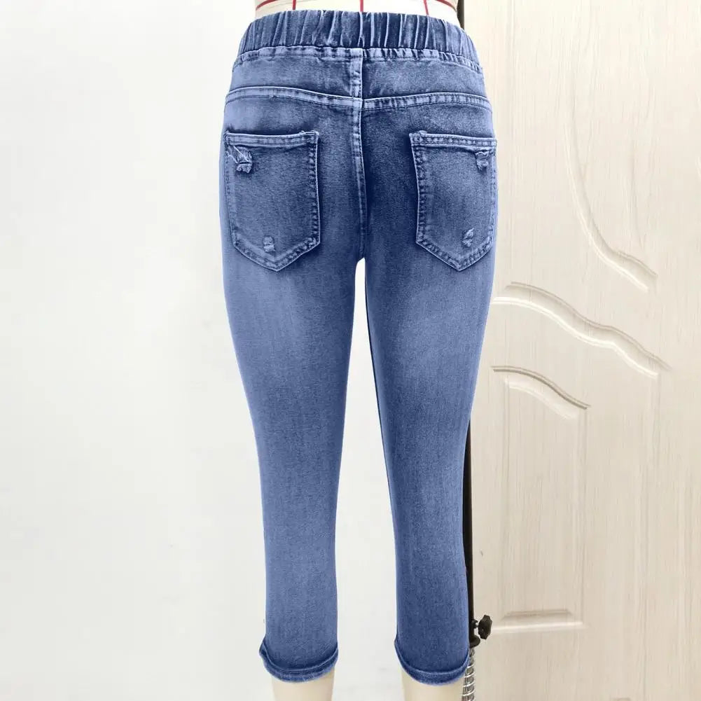 Luxurious high waist women’s leggings in vintage denim style, featuring convenient pockets and a sleek slim fit, perfect for casual wear.