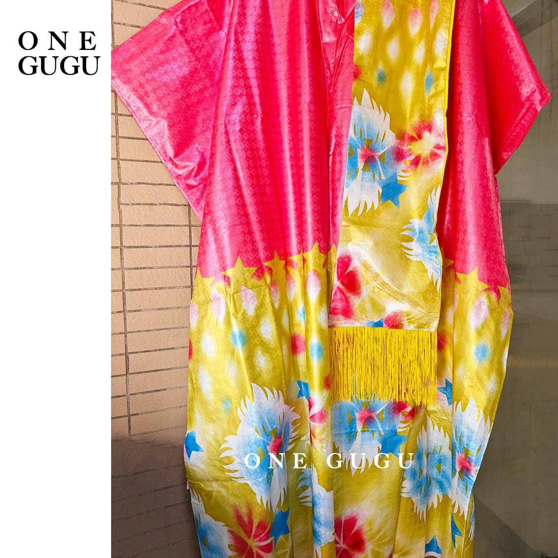 Chic presentation of the Luxury African Dashiki Wedding Dress styled elegantly on a model, highlighting its luxurious fabric and design.