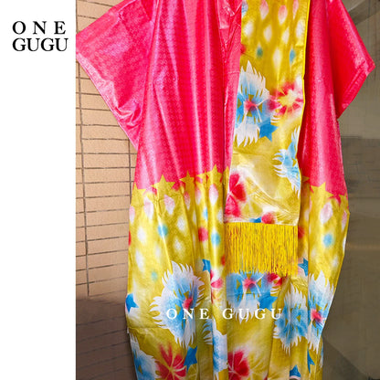 Chic presentation of the Luxury African Dashiki Wedding Dress styled elegantly on a model, highlighting its luxurious fabric and design.