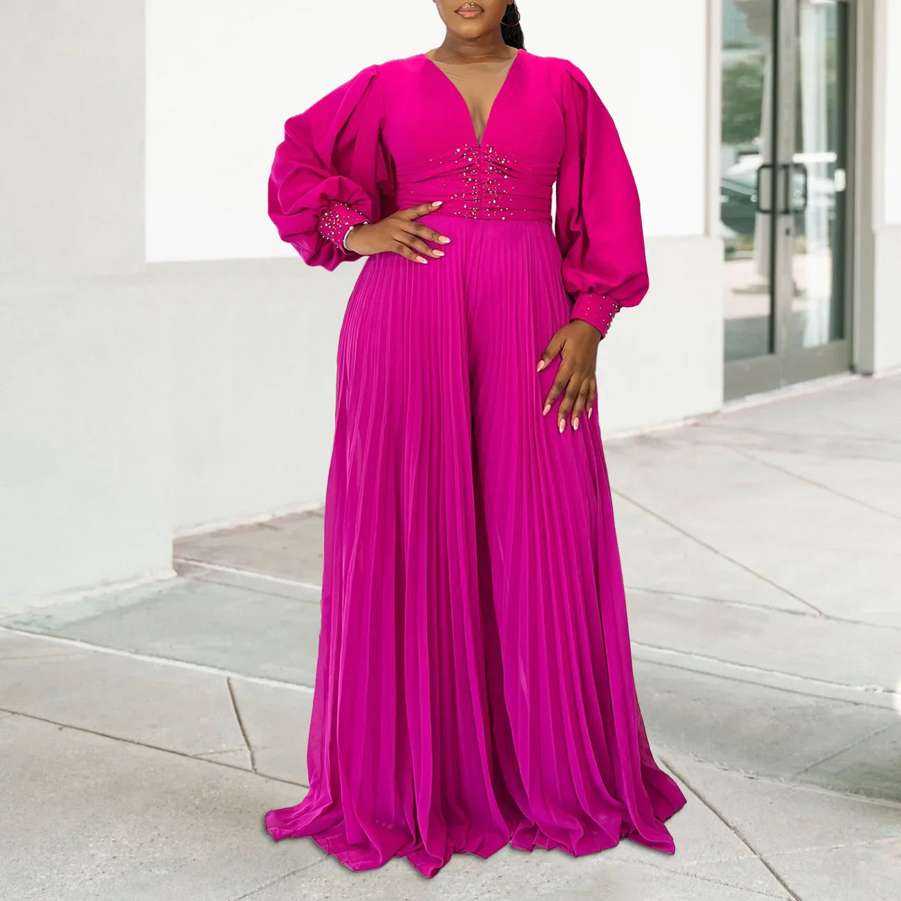 Stylish model wearing the elegant autumn dashiki jumpsuit in vibrant yellow-green, black, and rose red hues, ideal for trendy women's fashion.