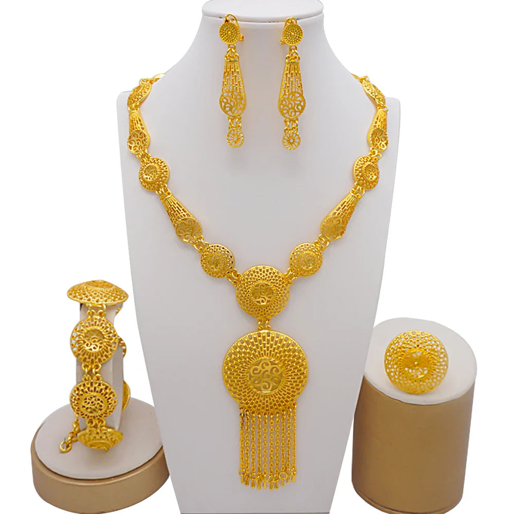 Exquisite African-inspired gold jewellery set for women, featuring a fashionable necklace, earrings, bracelet, and ring, perfect for adding a luxurious touch to any outfit.