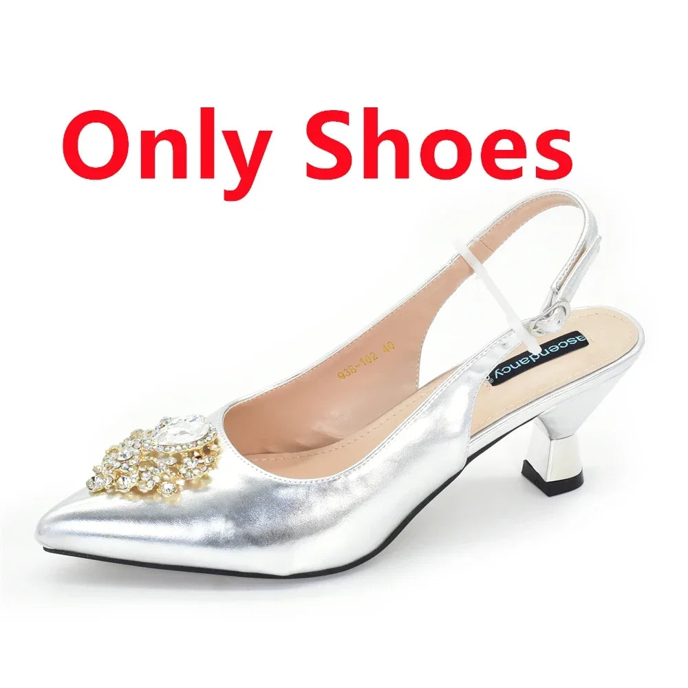 Elegant Italian women's heeled pumps in gold with crystal accents, featured in a luxurious matching bag set, perfect for parties and events.