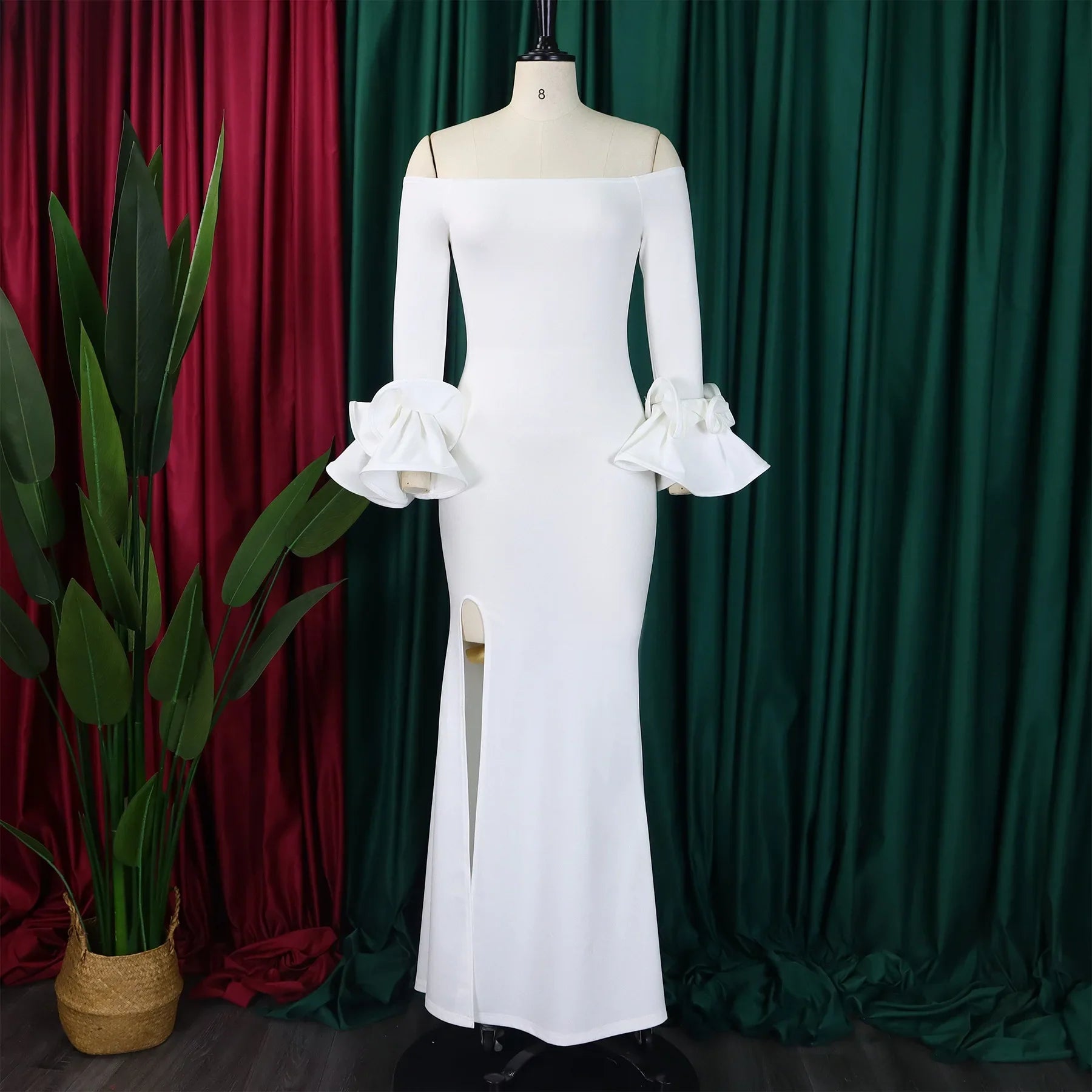 Chic FairyShely Plus Size Off Shoulder Long Sleeve Solid Bodycon Dress displayed on a model, emphasising the floor-length design and modest elegance.