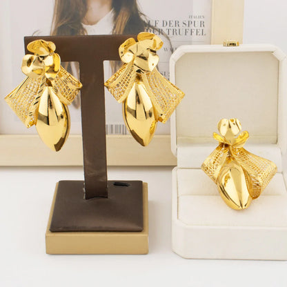 Elegant gold plated bow tie necklace set for women, showcasing exquisite fashion jewellery that adds a luxurious touch to any outfit.