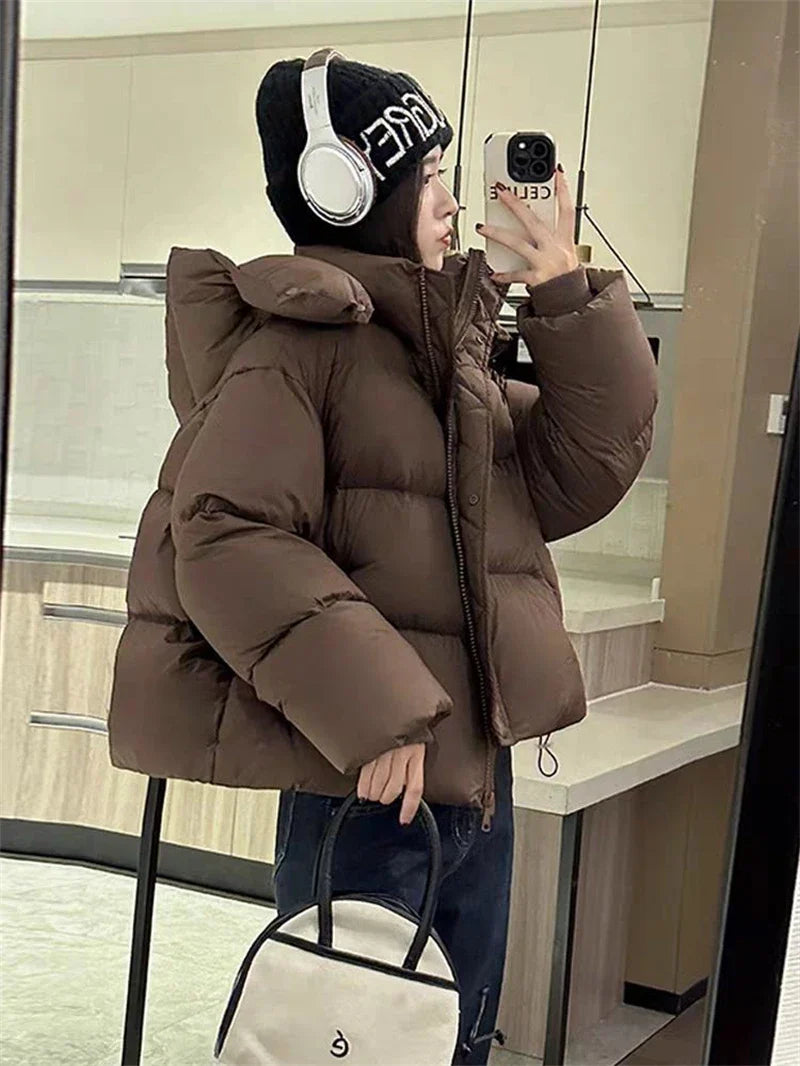 Elegant solid colour thick women's jacket, designed for ultimate warmth and style during the colder months.