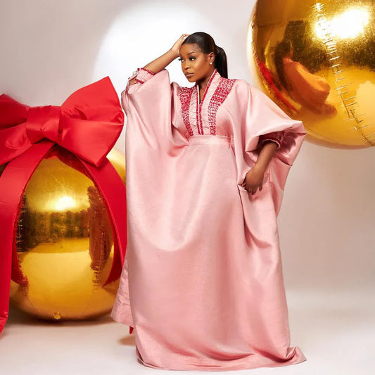 Close-up detail of the luxurious rhinestones on the V-Neck Turkey Dress, highlighting the exquisite craftsmanship and vibrant colour.