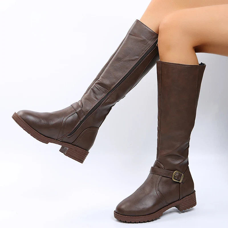 Elegant women's knee high platform long boots in luxurious PU leather featuring a stylish square heel and intricate buckle detail, perfect for winter fashion.
