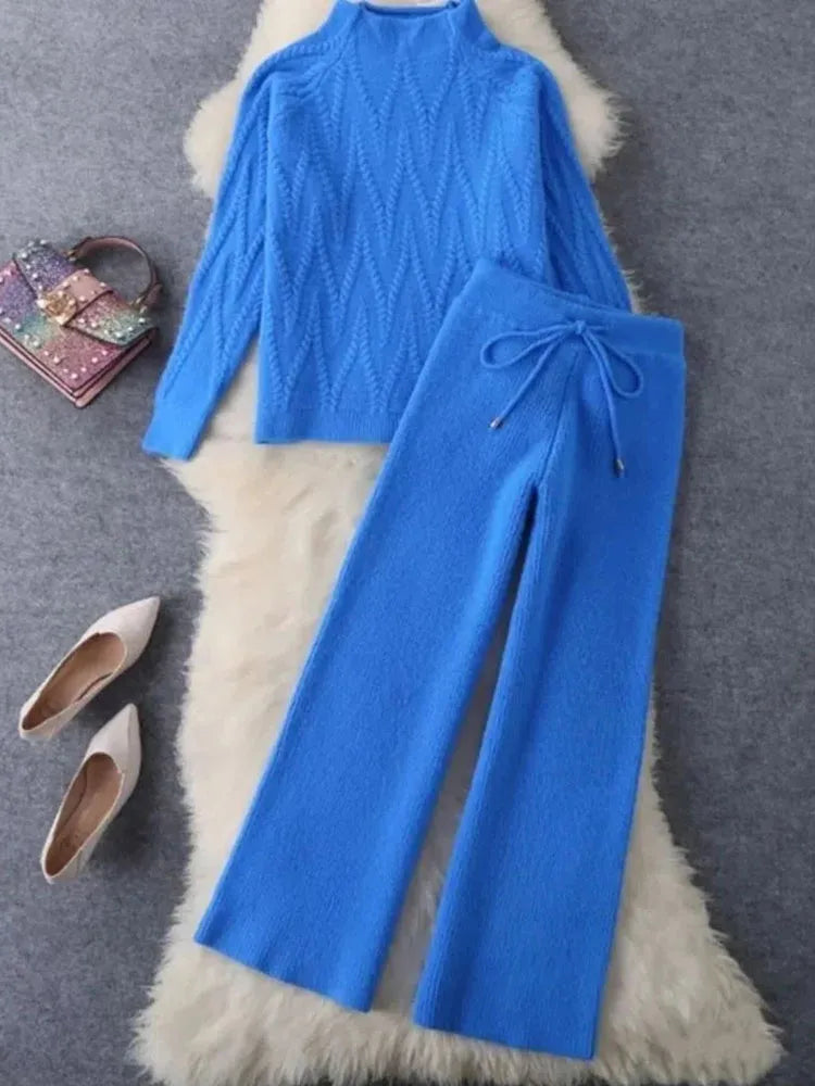 Beautiful winter ensemble for women, featuring a soft knitted sweater and elegant wide leg pants, embodying the essence of luxury and comfort.