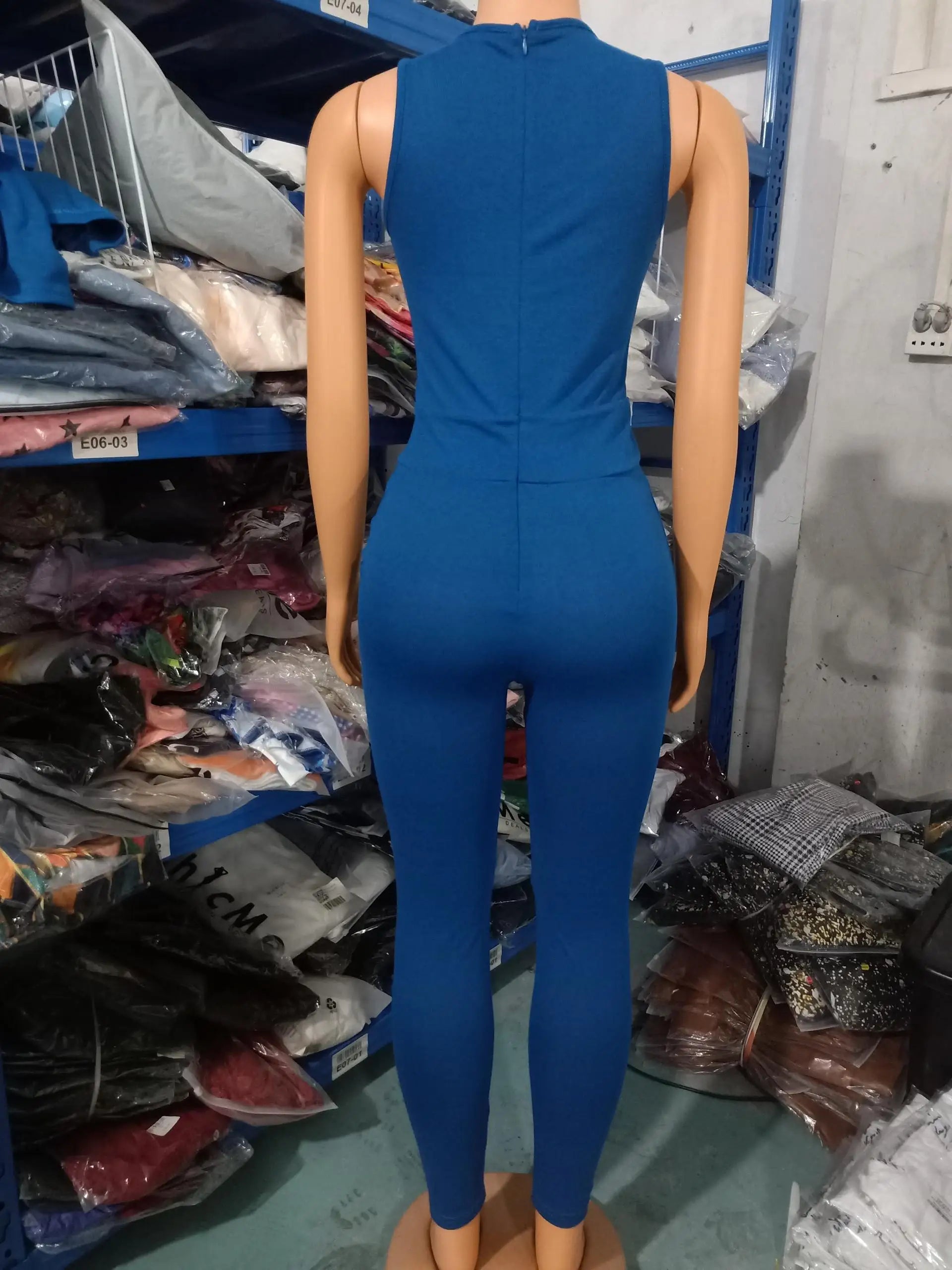 Timeless two-piece jumpsuit ensemble featuring solid colour, high waist design, and multifunctional pockets, embodying chic versatility.