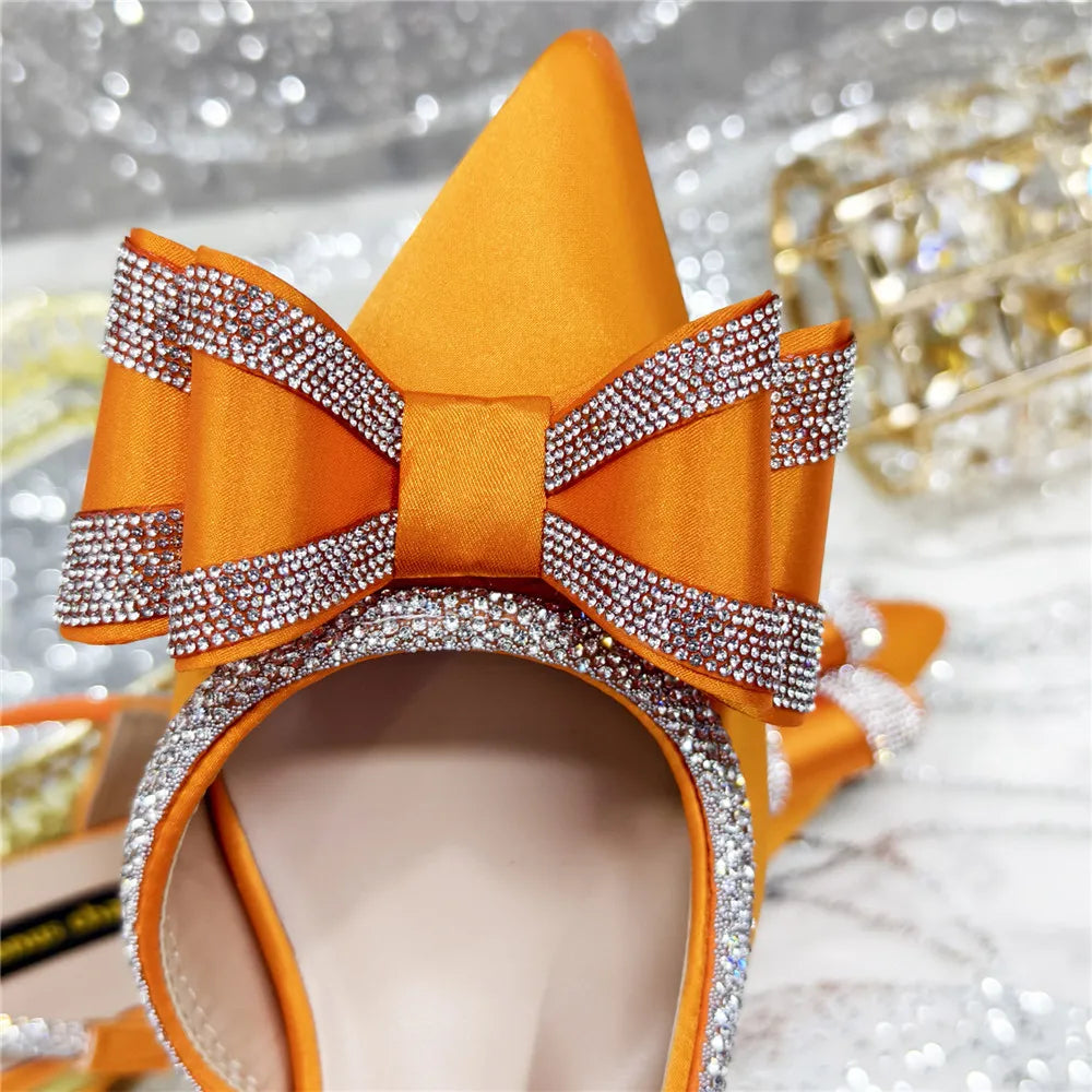 Stylish high-heeled sandals with elegant crystal accents, a comfortable slip-on style, catered for women who desire sophistication at summer parties.