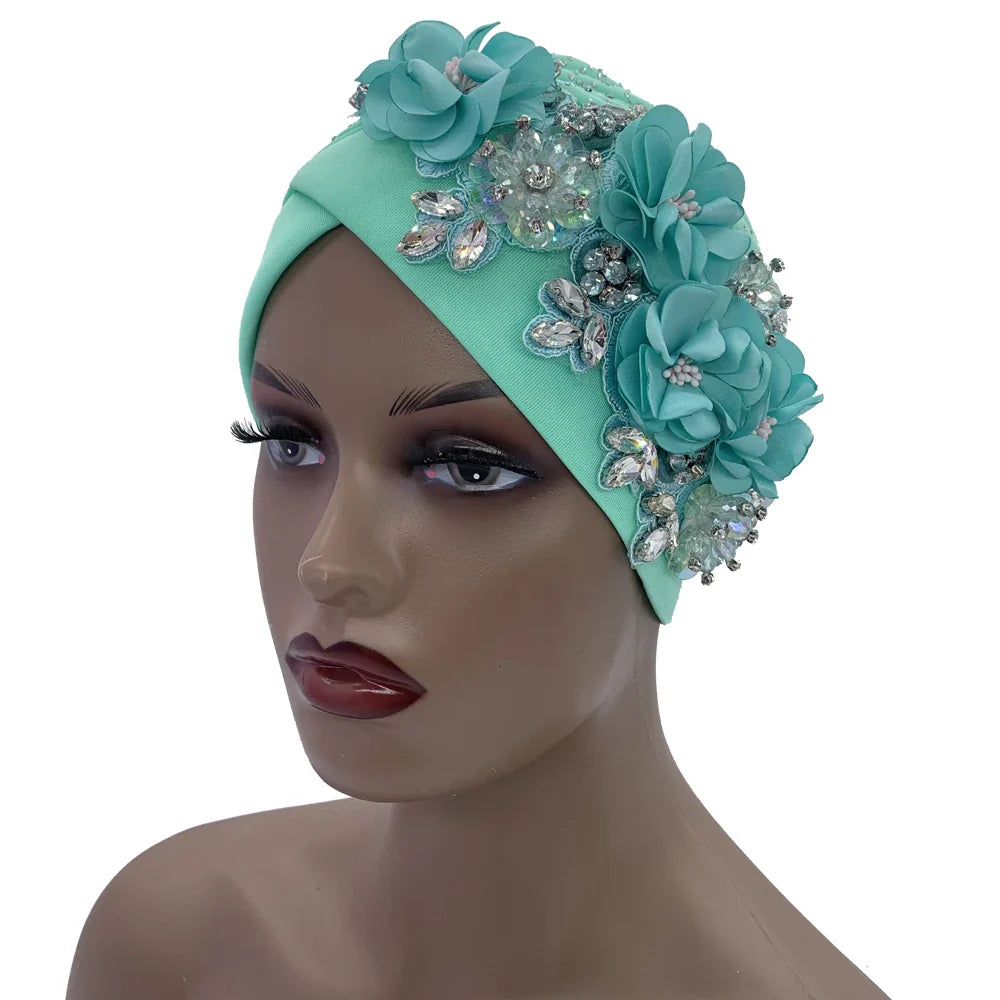 Stylish African turban cap adorned with elegant rhinestone accents, perfect for fashionable women seeking a luxurious head wrap option.