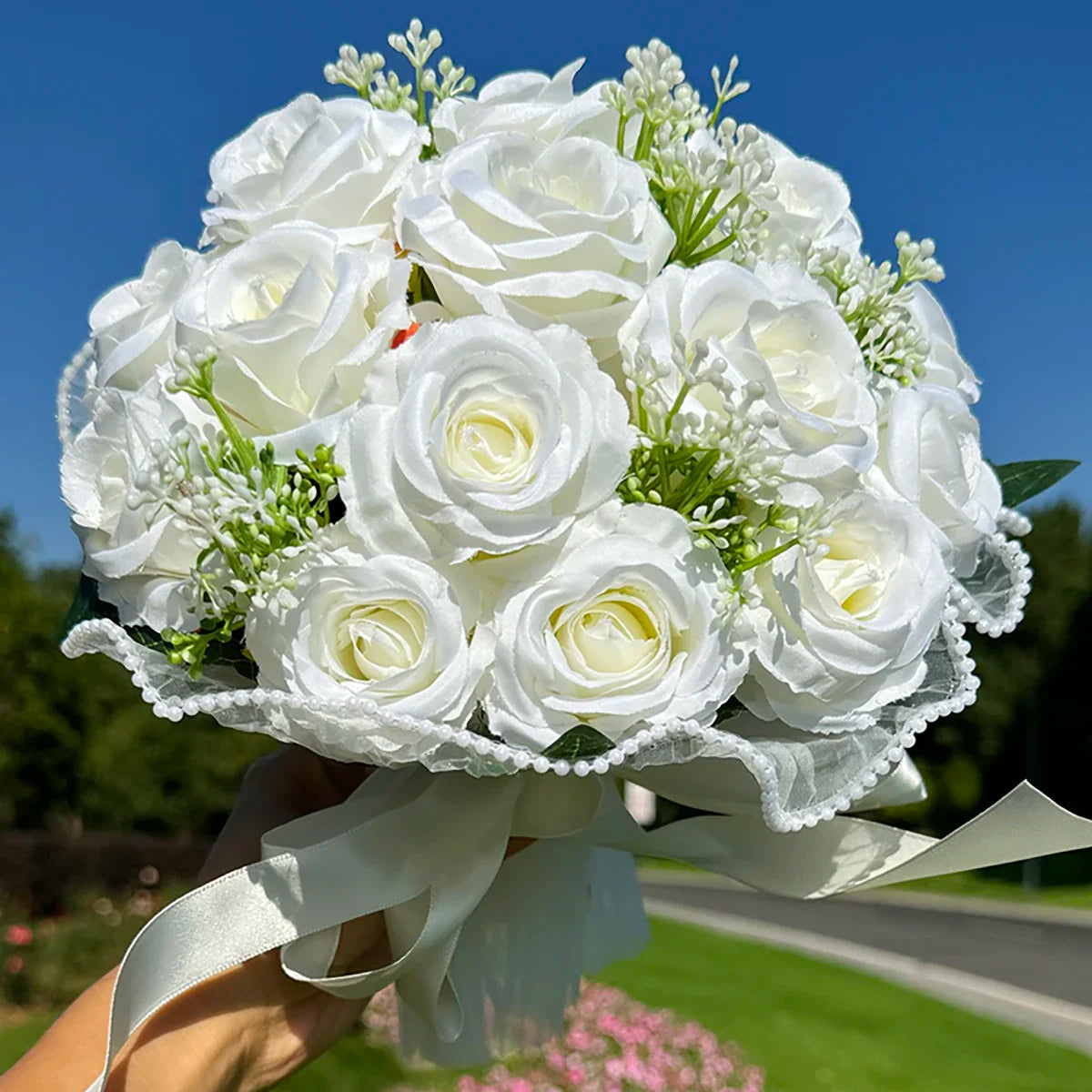 Elegant silk wedding bouquet featuring soft babysbreath roses arranged with luxurious pearl lace, ideal for brides and bridesmaids.