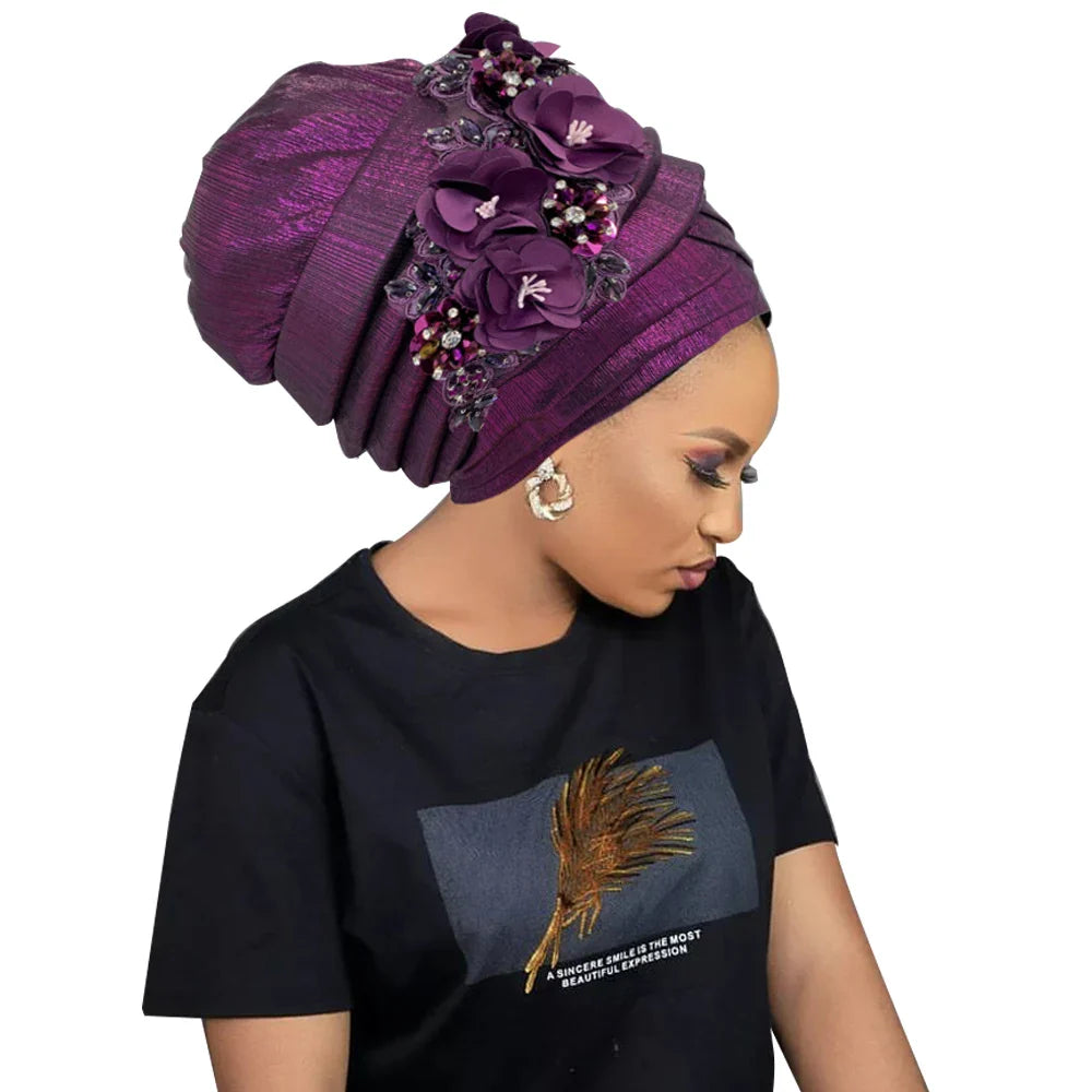 Luxurious African women's turban cap featuring a stunning diamond flower embellishment for elegant style.